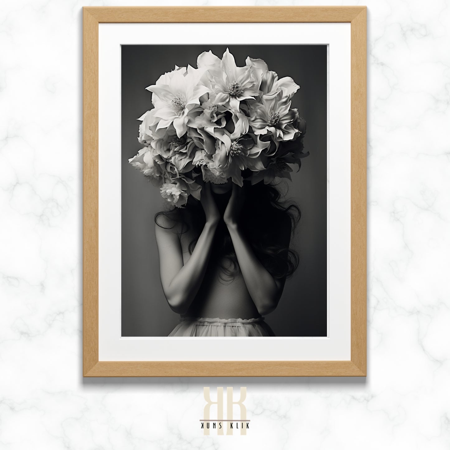 black and white photo of woman with a bouquet of flowers in front of her head