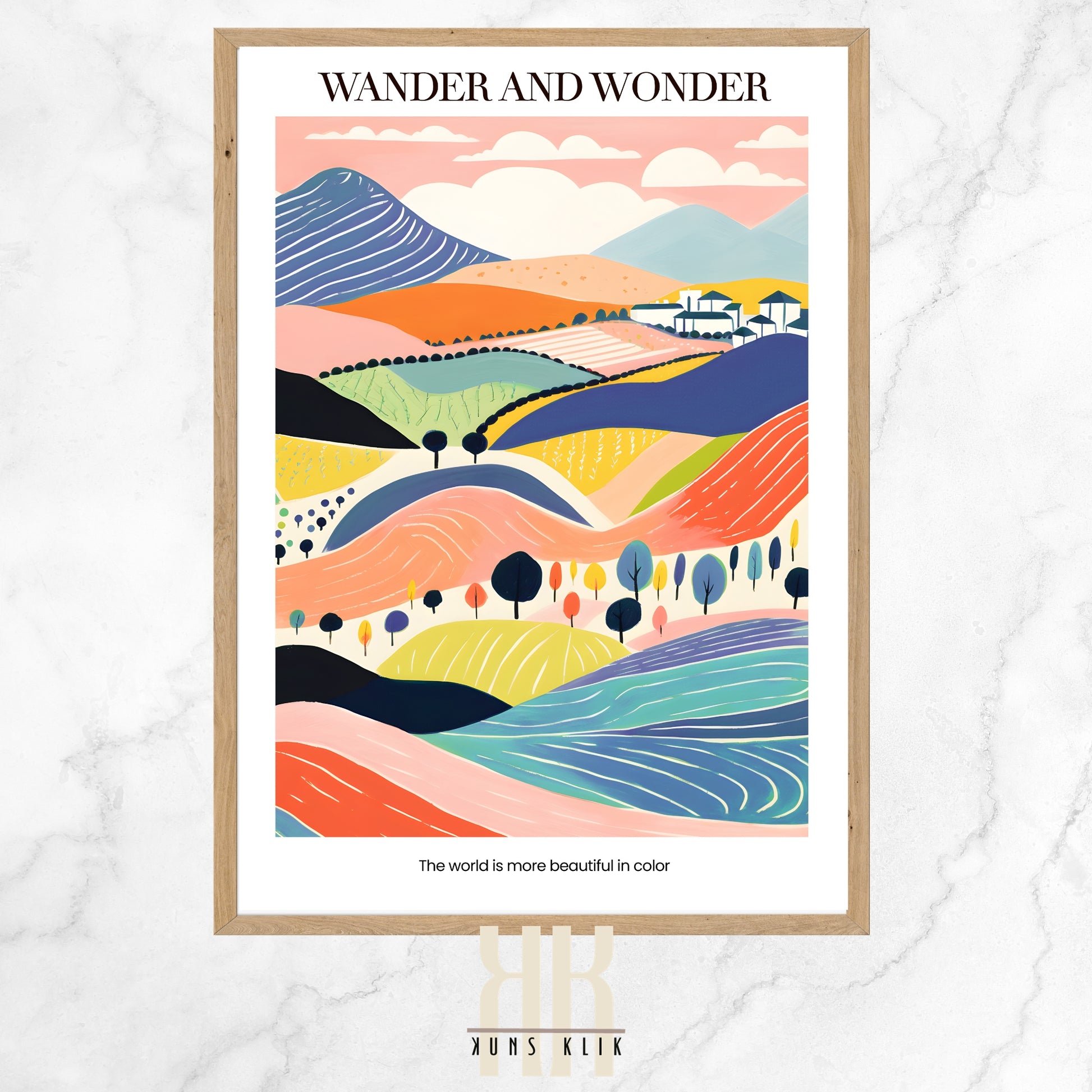 This art print, titled "WANDER AND WONDER," presents a stylized landscape scene filled with rolling hills, meandering rivers, and picturesque mountains under a soft pink sky with fluffy clouds. The landscape features a patchwork of fields in a variety of colors and patterns, with a small settlement of white houses nestled among the hills. The color scheme is vibrant and diverse, highlighting the natural beauty of the scene. 